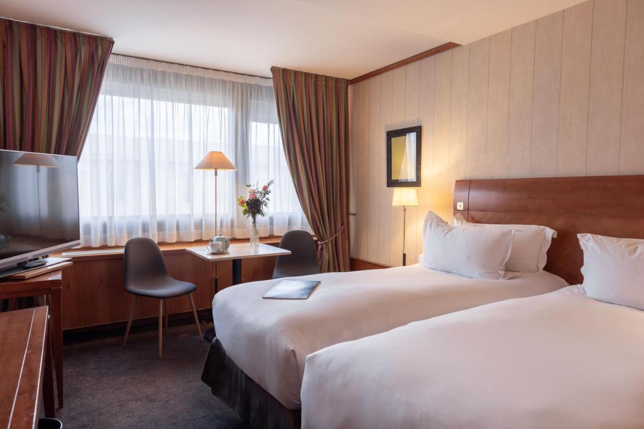 Готель Sofitel Lyon Bellecour Екстер'єр фото A typical room at the hotel