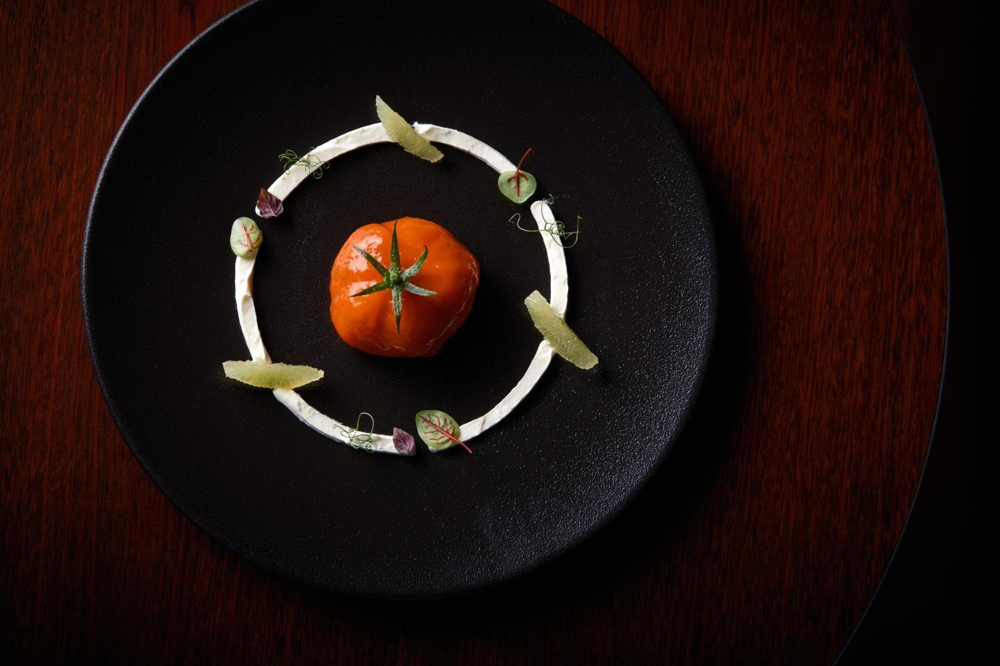 Готель Sofitel Lyon Bellecour Екстер'єр фото A tomato prepared for serving